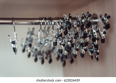 Set Of Metal Coat Hanger At A Wardrobe