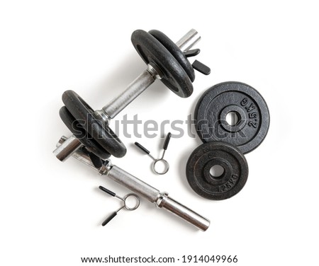 Set of metal dumbbells isolated from the background