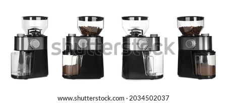 Set with modern electric coffee grinders on white background. Banner design 