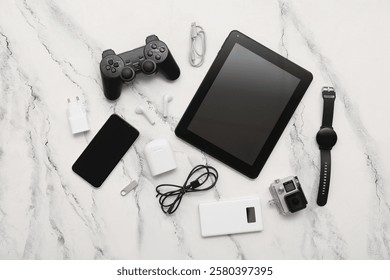 Set of modern gadgets with tablet computer on light background