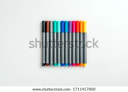 Set of multicolor felt pens, markers on white background, colorful fineliners.