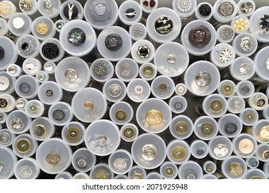 set of multi-colored buttons for sewing clothes, creativity, needlework, fabric. Hobby and tailor shop window with fabrics and button