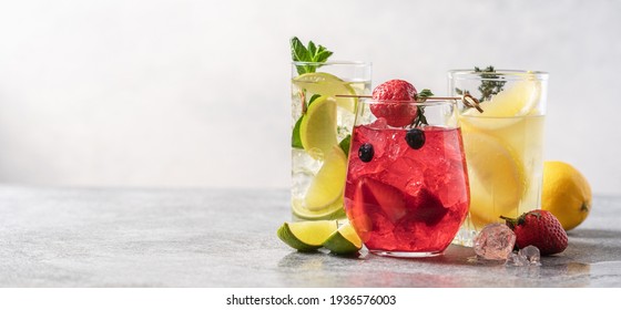 Set of multicolored summer drinks. Mojito, lemonade, berry, strawberry lemonade or cocktail with iced