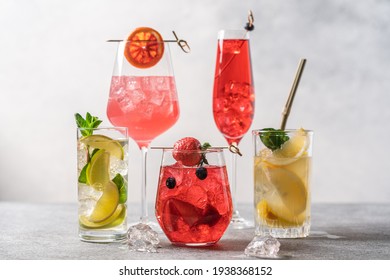 Set of multicolored summer drinks. Mojito, lemonade, red orange, berry, strawberry lemonade or cocktail with iced