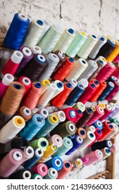 A Set Of Multi-colored Threads In A Sewing Studio - Sewing And Repairing Clothes