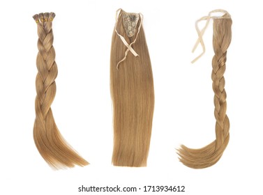 Set Of Multiple Fake Women Hair Extensions In Tails, Isolated On White Background. Dark Blonde Or Brown Color. And Different Attachment Types.