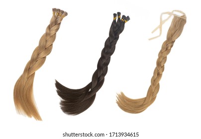 Set Of Multiple Fake Women Hair Extensions In Tails, Isolated On White Background. Dark Blonde And Brown Color. And Different Attachment Types.