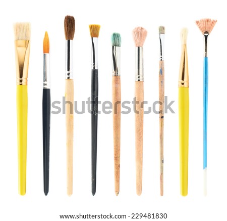 Set of multiple used and new drawing brushes isolated over the white background