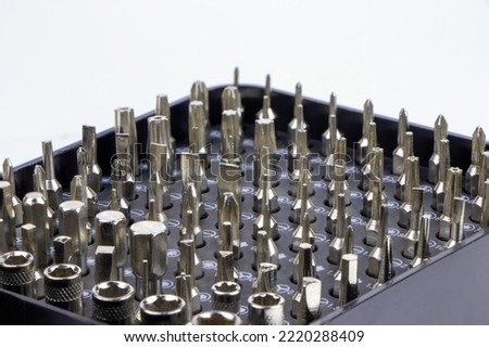A set of multi-size bits for screwdriver. A set of bits for repair isolated on white background