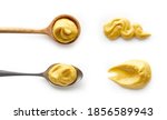 Set of mustard in spoons isolated on white background top view