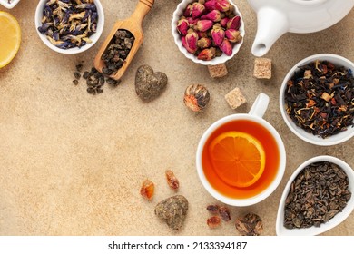 Set natural dried tea and teapot. Teatime. Tea ceremony concept. Top view. Flat lay.