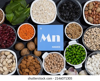 A set of natural products rich in manganese. Organic manganese sources. Healthy food concept. Cardboard sign with the inscription. Top view,