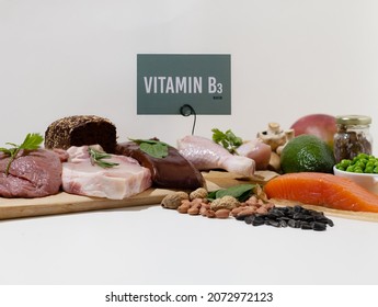 A set of natural products rich in vitamin B3 Niacin. Healthy food concept. Green Cardboard sign with the inscription.