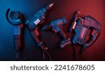Set of new power tools isolated on a black background, drill, puncher, electric saw, jigsaw, circular saw