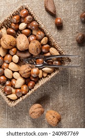 Set of nuts with a nutcracker. Selective focus.