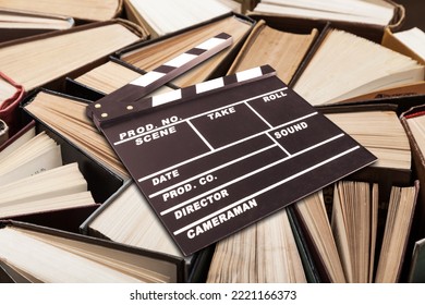 Set Od Books And Movies Slate On The Desk