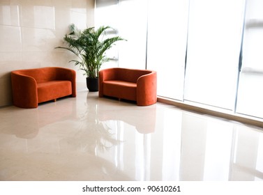 A set of office furniture near windows