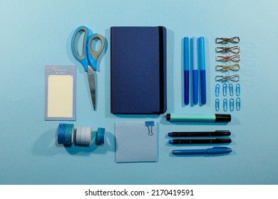 Set Of Office Supplies On A Blue Background