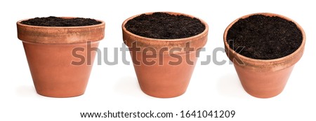 Set of  old ceramic flower pot with soil isolated on white 