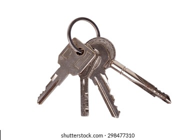 Set Of Old House Keys Isolated On The White
