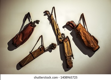 Set Of Old Vintage Golf Clubs In Bag Hanging On The Wall