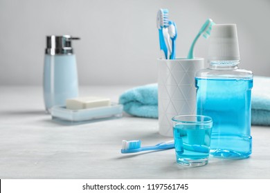 Set Of Oral Care Products On Light Table. Teeth Hygiene