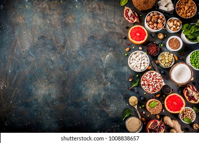     Set Of Organic Healthy Diet Food, Superfoods - Beans, Legumes, Nuts, Seeds, Greens, Fruit And Vegetables. Dark Blue Background Copy Space Top View