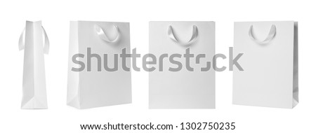 Set of paper bags for shopping on white background. Mockup for design 