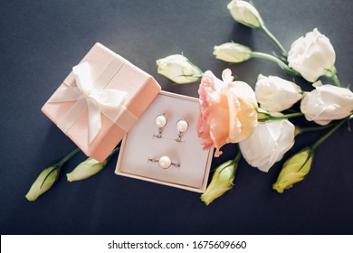 Set Of Pearl Jewellery In Gift Box With Flowers. Silver Earrings And Ring With Pearls As A Present For Holiday.