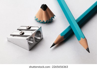 A set of pencils. The concept of a broken pencil. Sharpening a pencil. Close up. Macro. Pencil sharpener. - Powered by Shutterstock