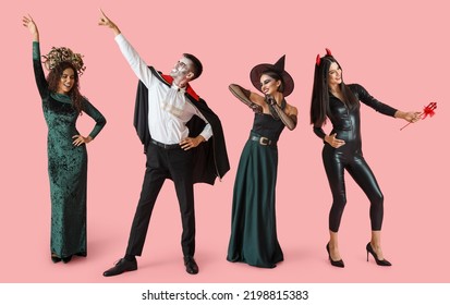 Set of people dressed for Halloween on pink background - Shutterstock ID 2198815383