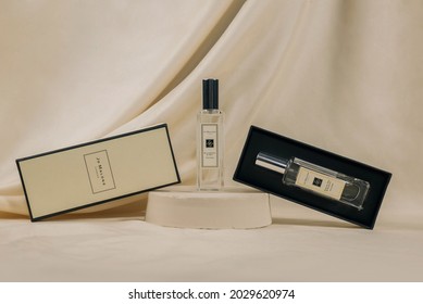 Set of the perfume company Blackberry Bay English Oak and Hazelnut by Jo Malone through glasses with water.Gift for March 8, Valentine's Day. Electoral focus - Russia, Moscow-08.03.2020 - Shutterstock ID 2029620974