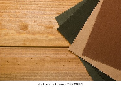 Set piece of cloth for tailoring on a wooden surface.