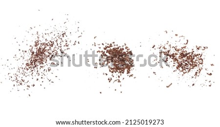 Set pile chopped, milled, powder dark chocolate isolated on white, top view