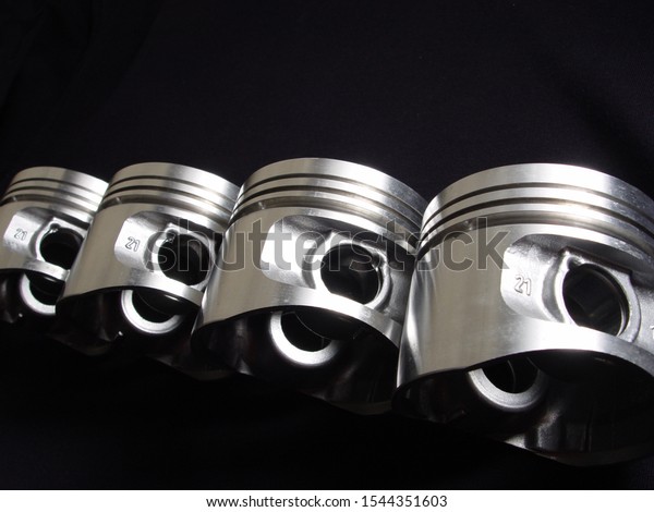 A set of pistons for an internal combustion\
engine. Piston.