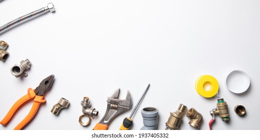 Set Of Plumbing And Tools On The White Background