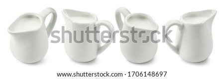 Set of porcelain ceramic milk jars or creamers isolated on white background. Package design element with clipping path