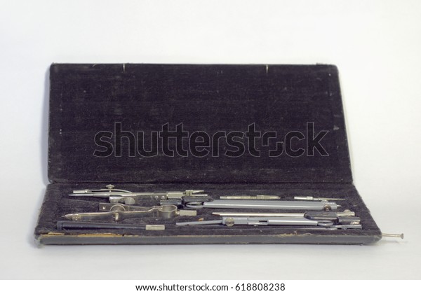 Set of precision technical drawing instruments in\
black case
