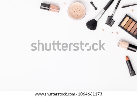 set of professional decorative cosmetics, makeup tools and accessory on white background with copy space for text. beauty, fashion, party and shopping concept. flat lay composition, top view