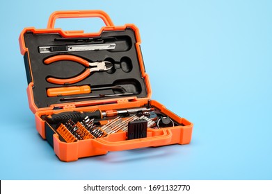. A set of professional tools in a case for repairing phones, smartphones, computers and other office equipment.