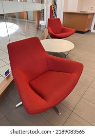 A Set Of Red Chairs In A Waiting Area At A Bank.  Taken On August 11 2022 In New Westminster, BC