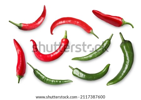 Set with red and green hot chili peppers on white background