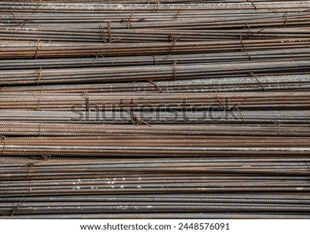 set of reinforced steel. metal, iron rusty background. Steel armature. Gray new metal fittings. The bars of reinforcement.