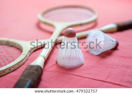Set of retro badminton equipment (rackets and shuttlecocks), sport with long tradition, now on olympic games