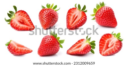 Set of ripe whole and sliced strawberries.