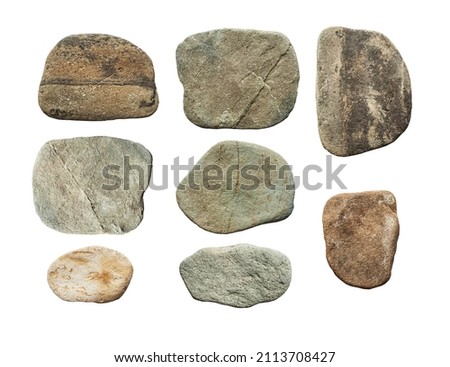 A set of rough relief stones in earthy and gray tones. Flat pebble rock isolated on white background