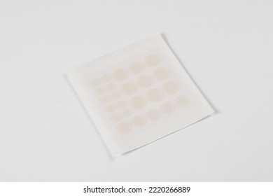 Set Of Round Acne Patches On White Background. Close-up Acne Patch Facial Rejuvenation. Facial Cleansing Cosmetology