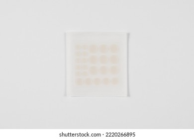 Set Of Round Acne Patches On White Background. Close-up Acne Patch Facial Rejuvenation. Facial Cleansing Cosmetology