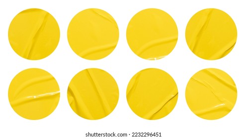 Set of round yellow paper stickers mock up blank tags labels, isolated on white background with clipping path for design work - Shutterstock ID 2232296451