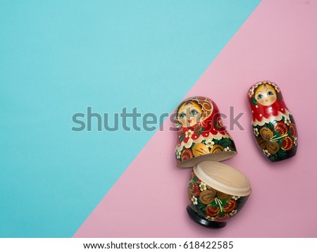 Set of Russian  dolls on color background.